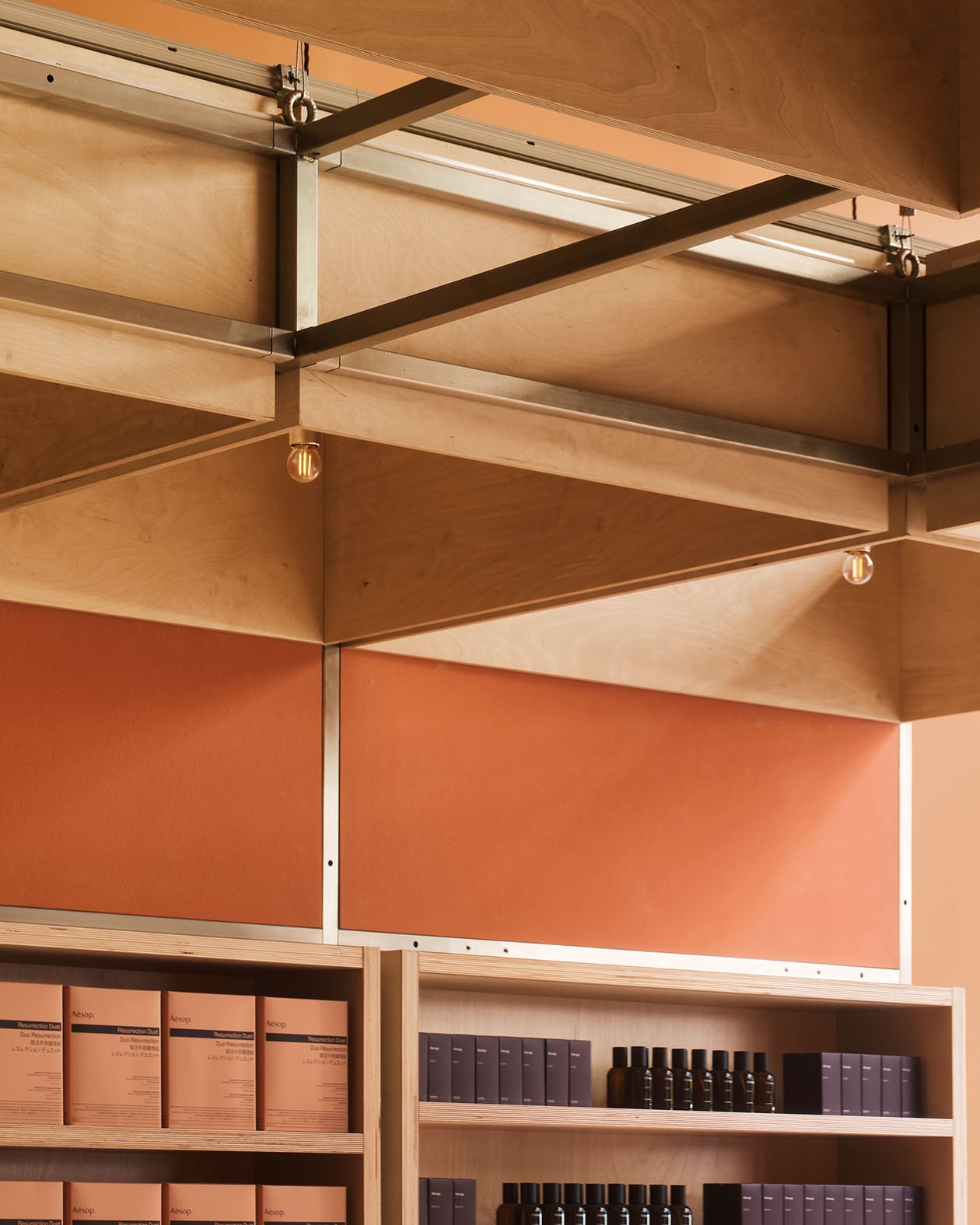Aesop One New Change store ceiling and shelf display.
