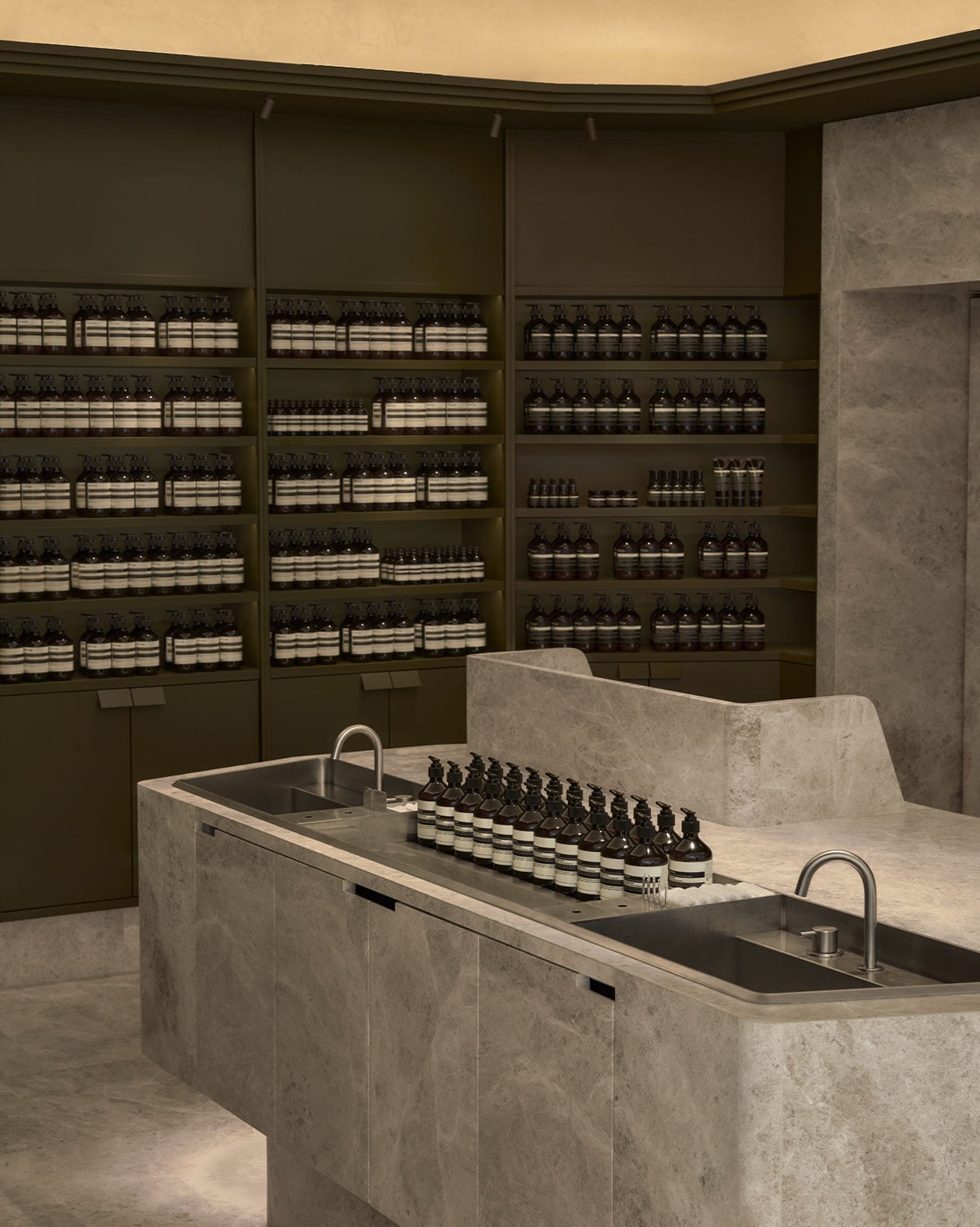 Aesop Macau DFS Four Season store interior in warm grey stone with sink