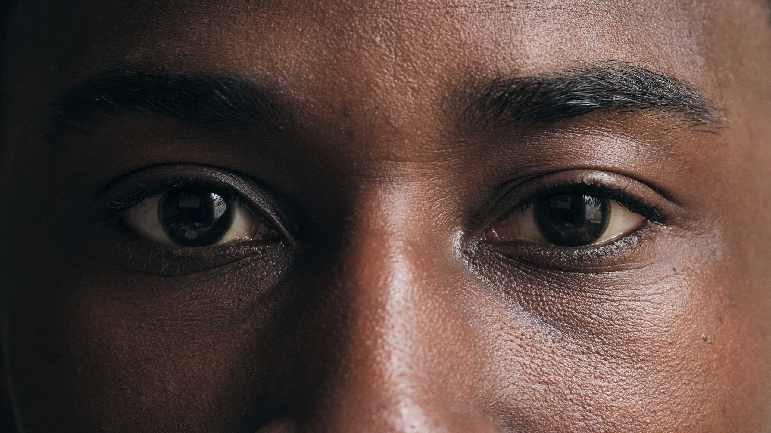 Close-up photograph of eyes.