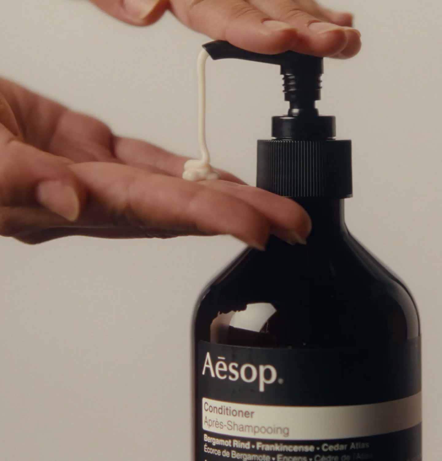 Hand pumping Aesop conditioner