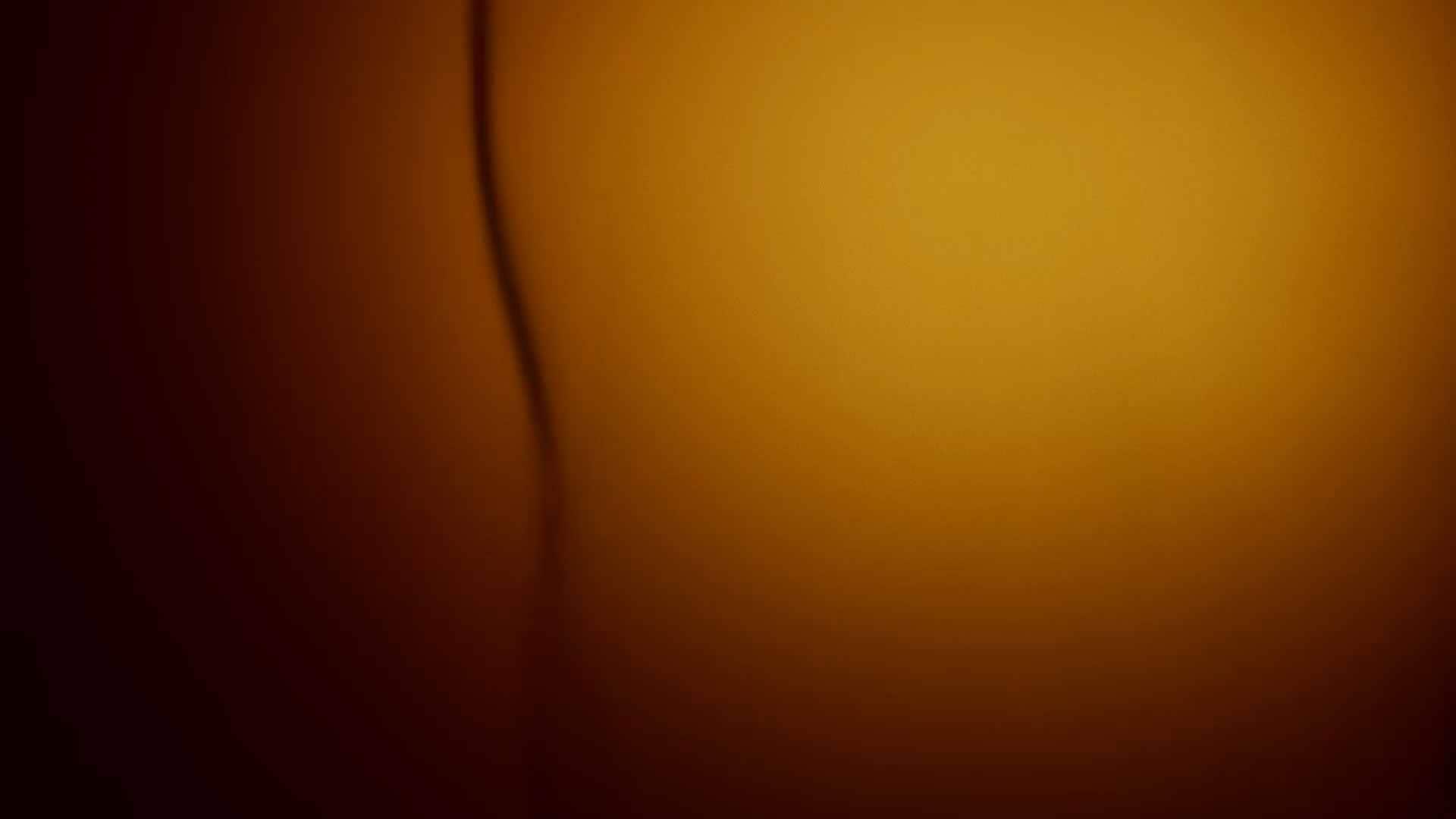 An abstract background with a warm orange gradient