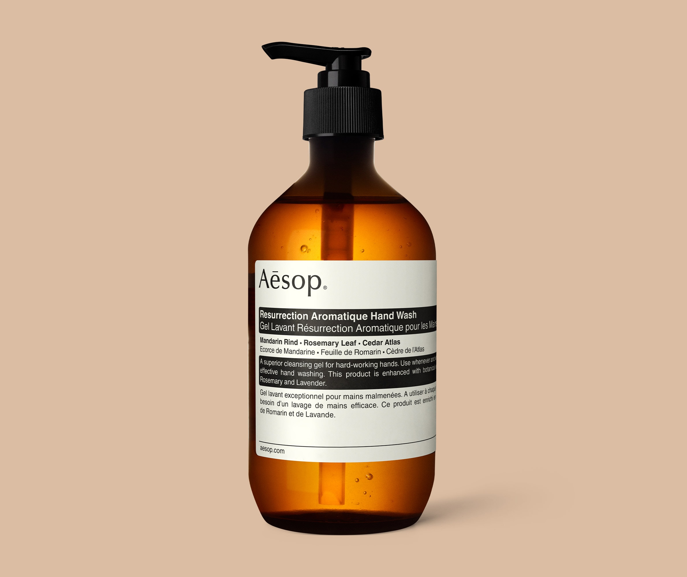 Resurrection Aromatique Hand Wash in amber bottle with pump in beige background
