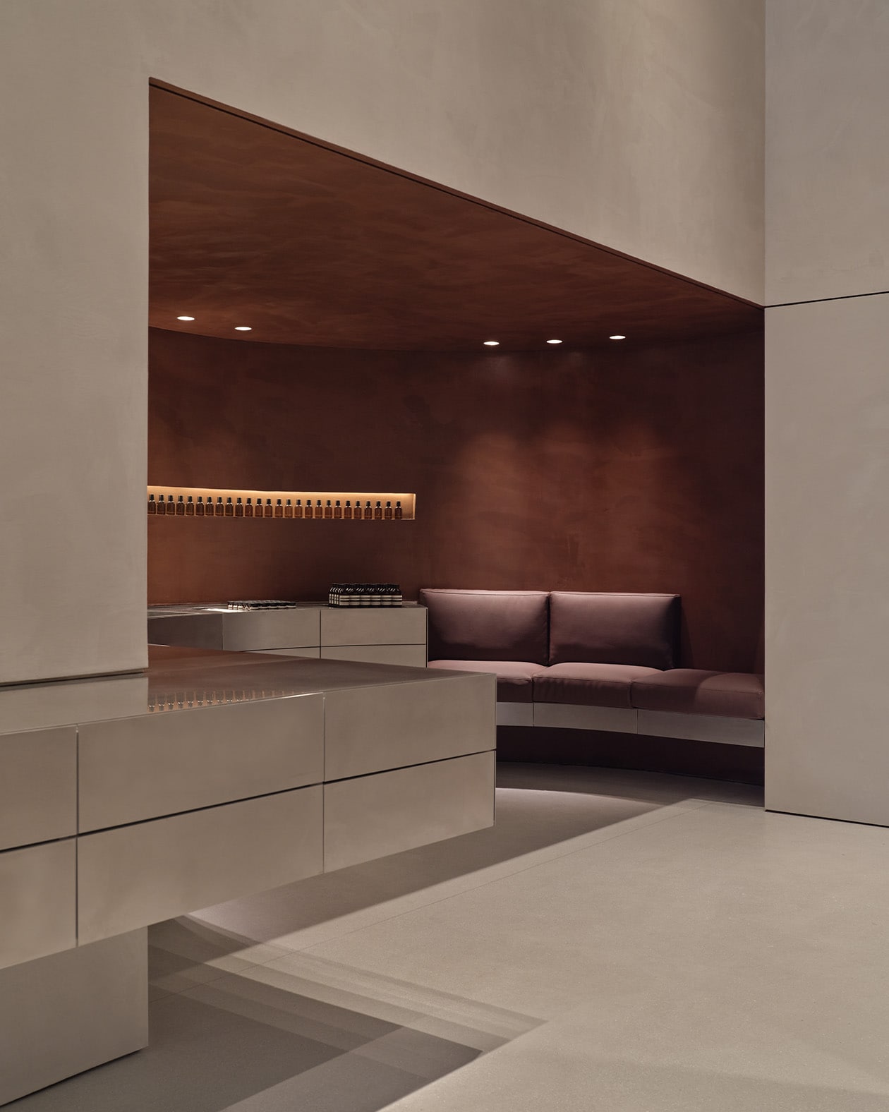 Aesop Passeig de Gracia store interior featuring product display and seating area
