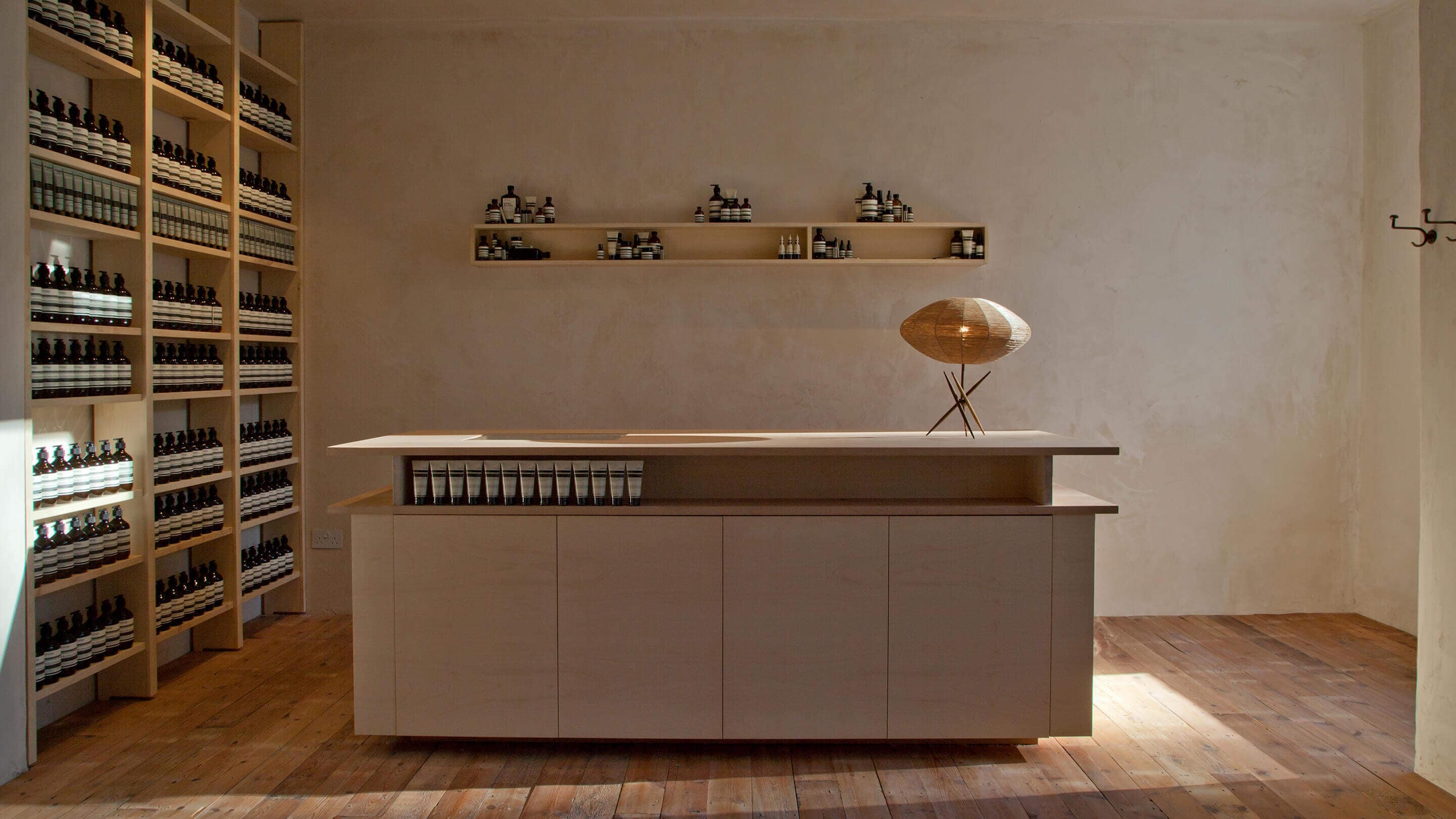 Aesop Stockbridge store interior featuring large standalone counter.