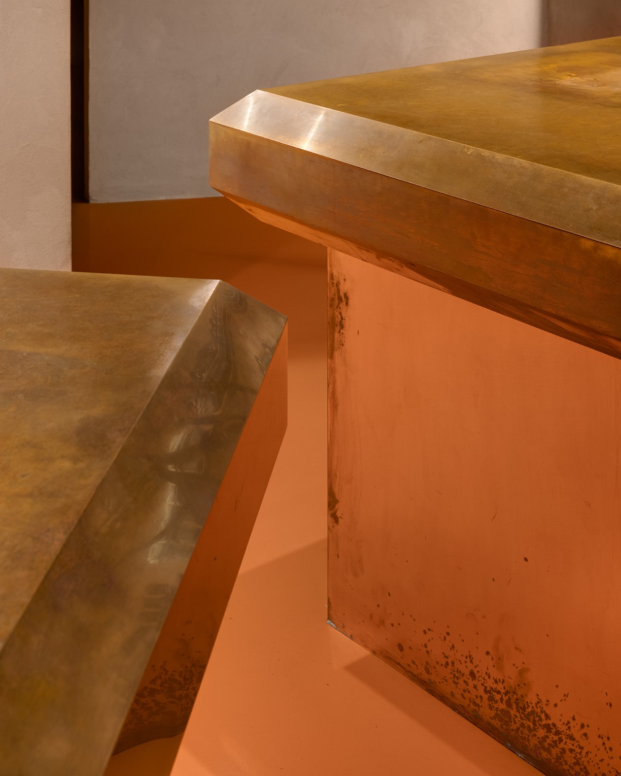 detail shot of corners of copper countertops on brown